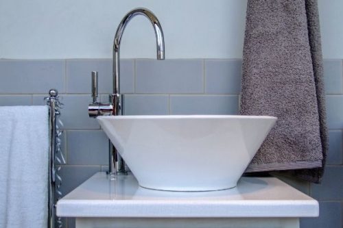 bathroom renovations represented by a new modern bathroom sink in Baltimore